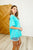 In the Rotation Exposed Seam Tee in Aqua