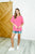 In the Rotation Exposed Seam Tee in Hot Pink