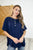 In the Rotation Exposed Seam Tee in Navy